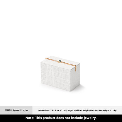 White Linen Jewelry Display Set with Multi-Level Risers for Vendors
