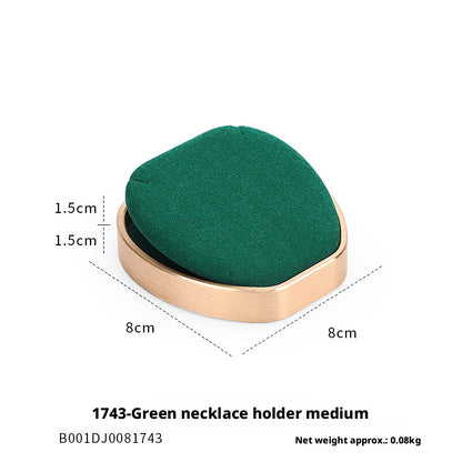 Green Suede and Gold Jewelry Showcase Trays and Necklace Busts