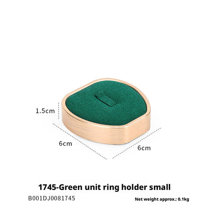 Green Suede and Gold Jewelry Showcase Trays and Necklace Busts